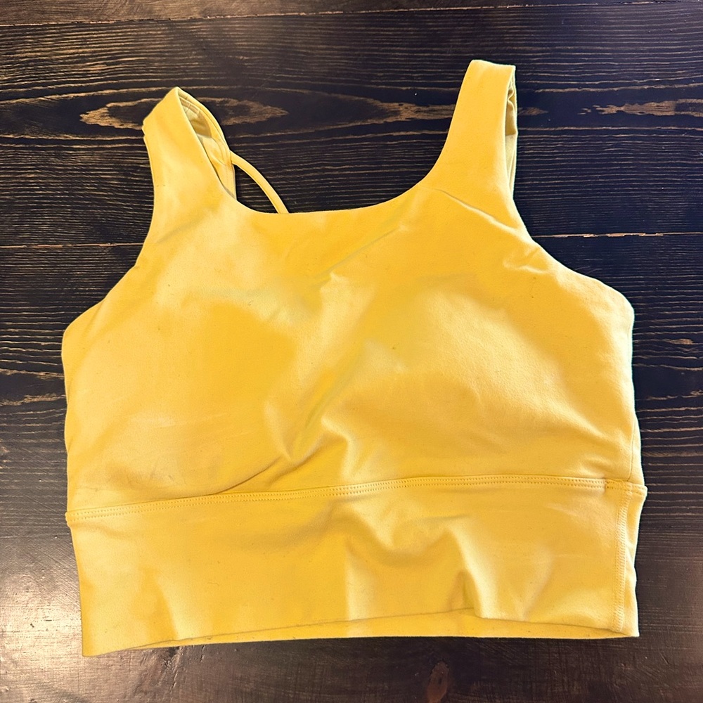 Yellow sports bra.